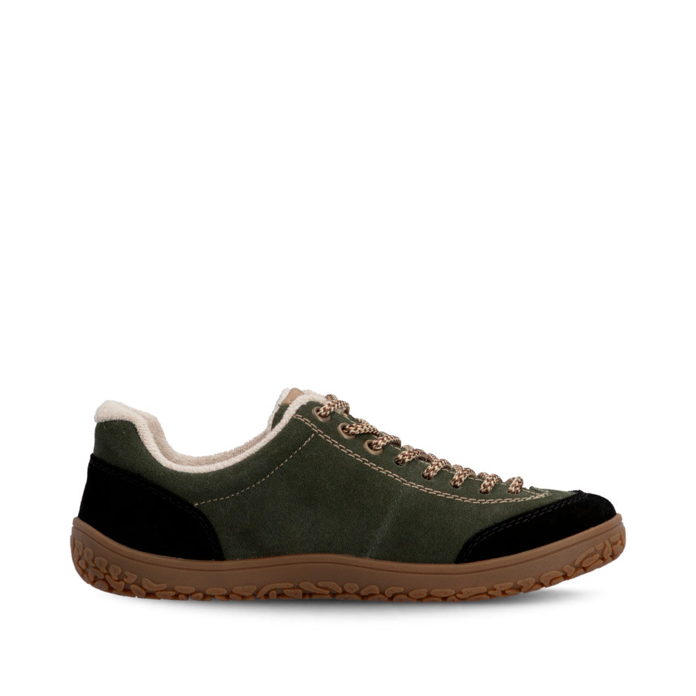 A low-top casual sneaker shown in profile against a plain white background. The shoe features an olive green suede upper with black suede overlays on the toe and heel, a cream-colored collar lining, brown laces, and a brown textured rubber sole.