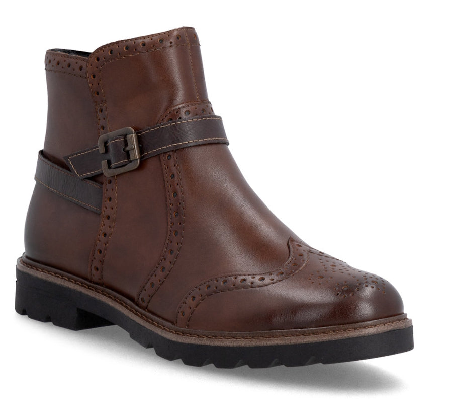 A brown leather ankle boot with a side buckle strap, brogue detailing, and a black lug sole, shown on a white background.
